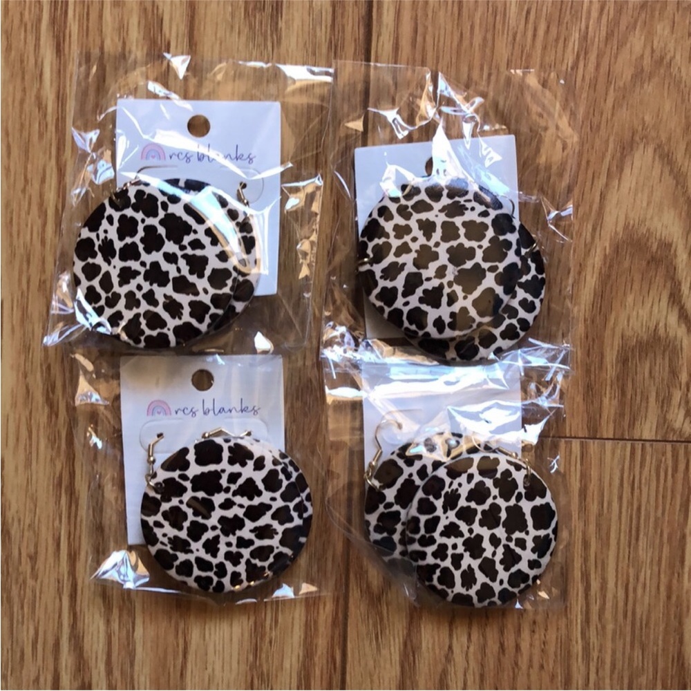 Animal print round wood earrings by RCS Blanks. New never been worn. 4 pair lot